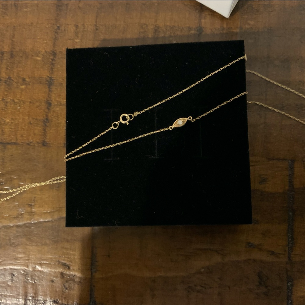 14k gold eye diamond necklace